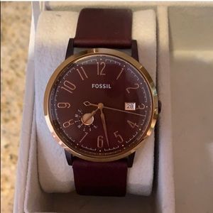 Maroon fossil watch